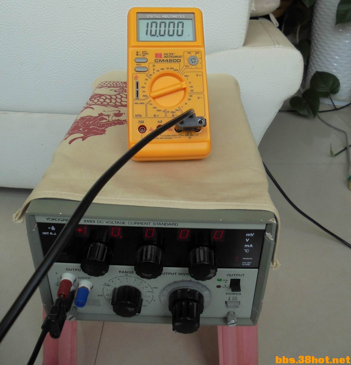 10V