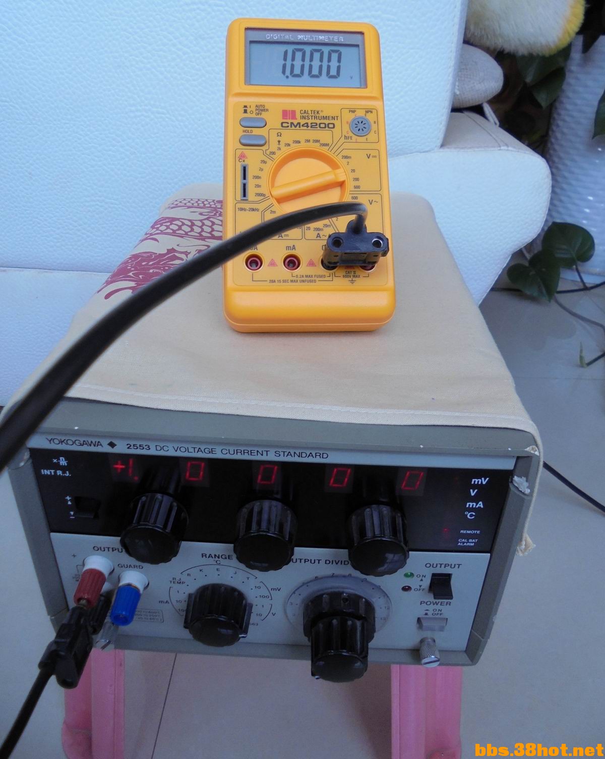 1V