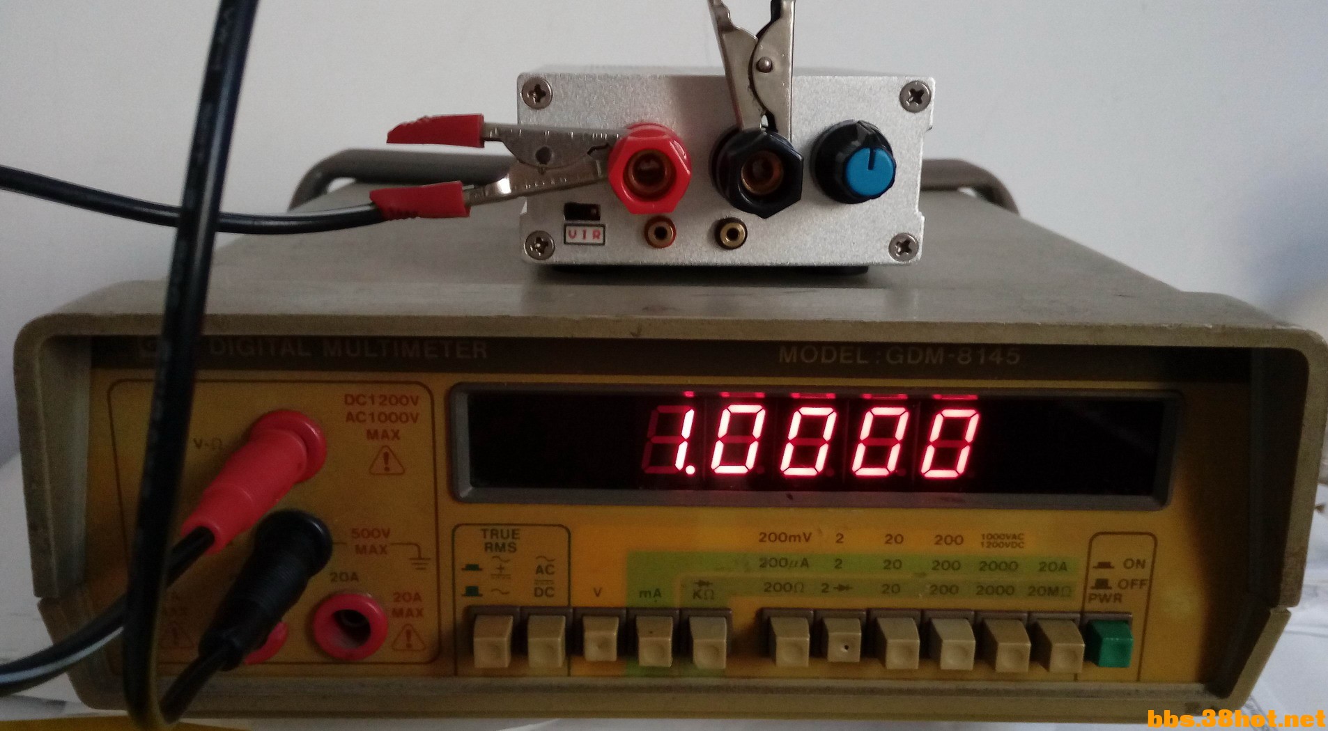 1V